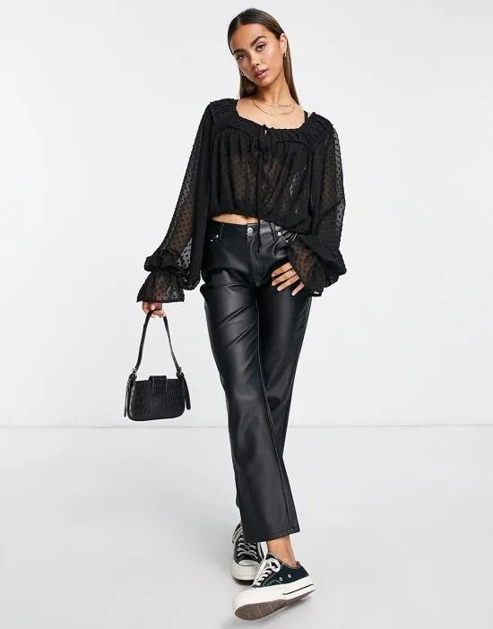 textured blouse with volume sleeve & tie front in black