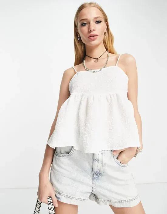 textured bow back peplum cami top in white
