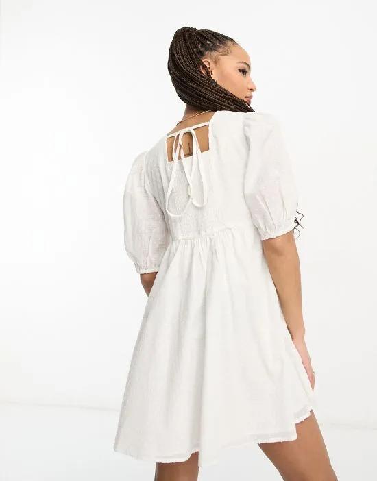 textured cotton puff sleeve mini smock dress in white