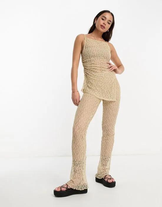 textured mesh flare pants in beige - part of a set