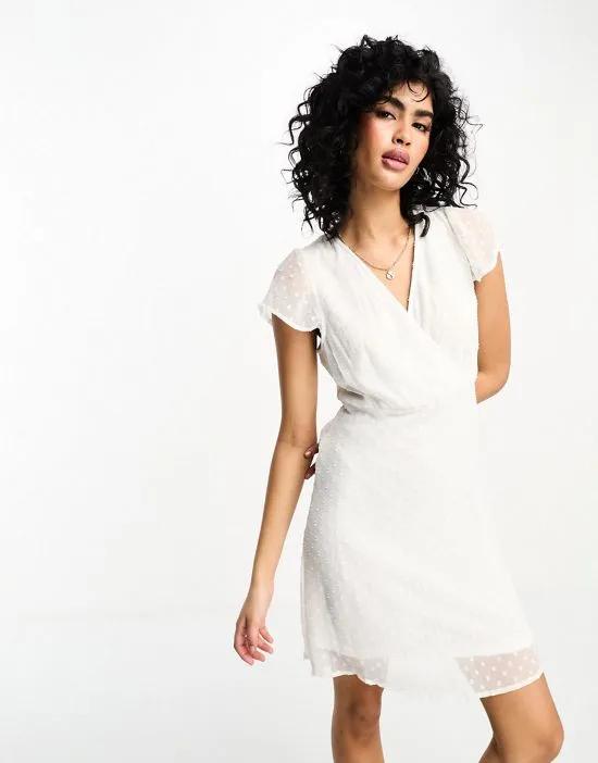 textured mini dress in white
