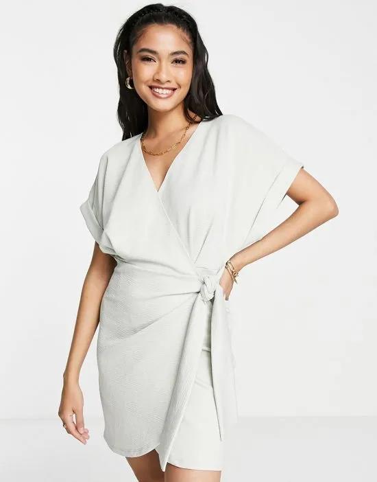 textured short sleeve mini wrap dress in gray