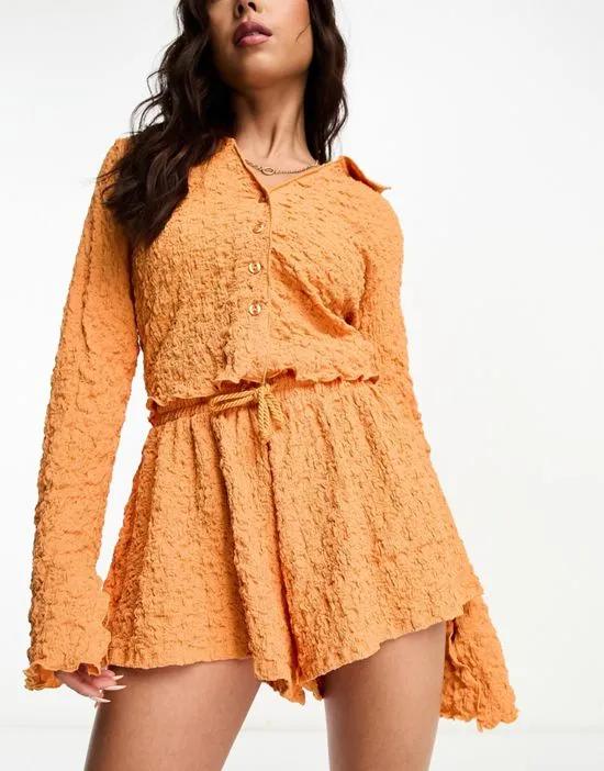 textured shorts in orange - part of a set
