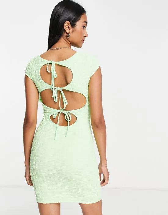 textured T-shirt mini dress with back tie detail in light green