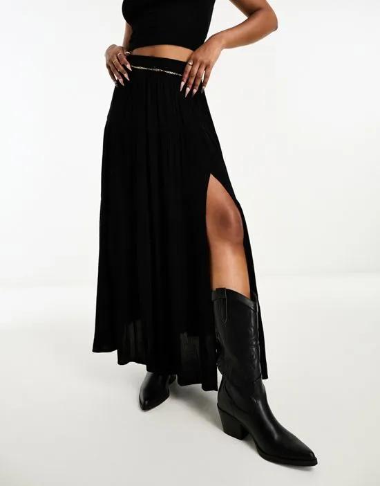 textured tiered maxi skirt in black
