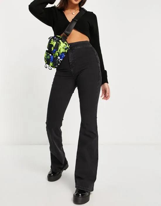 Three stretch flare jeans in washed black