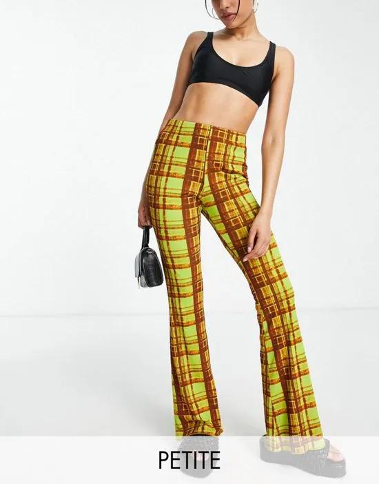 tissue mesh flared pants in green grunge check