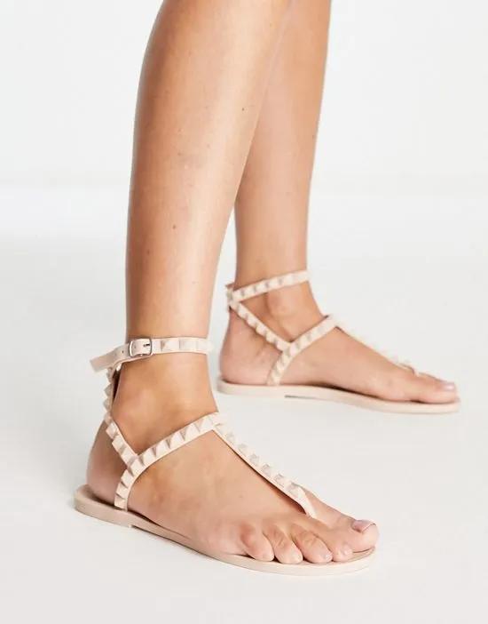 toe post jelly sandals with stud details in blush