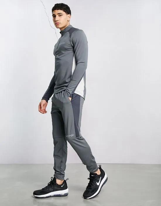 training sweatpants with contrast panels in skinny fit