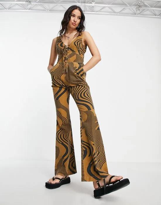 twill lace up front jumpsuit in swirl print