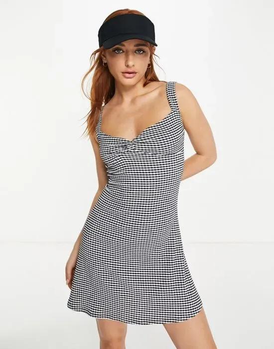 twist front cut out jersey gingham mini dress in monochrome