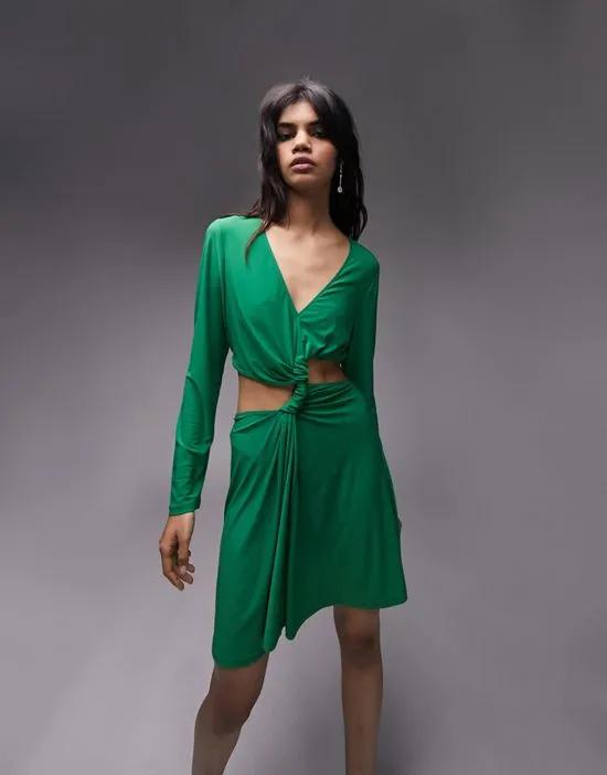 twist front long sleeve cut out mini dress in green