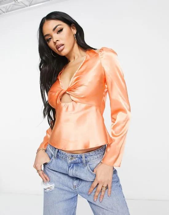 twist front satin blouse with halter neck in peach