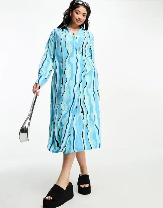 Urban Threads Plus wrap shirt dress in blue abstract print