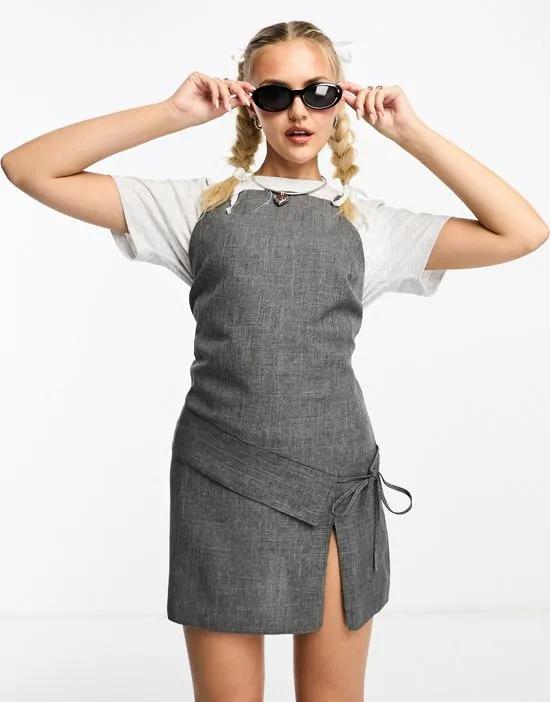 utility micro mini dress with strappy back detail in gray