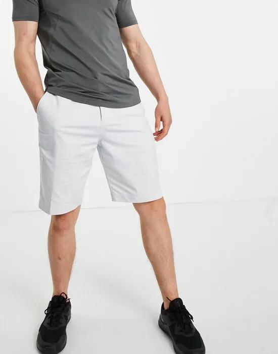 UV Dri-FIT 10.5-inch chino shorts in white