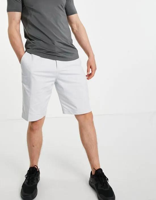 UV Dri-FIT 10.5-inch chino shorts in white