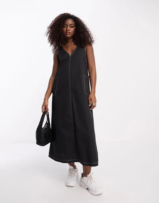 v-neck cargo midi dress in black with contrast stitching