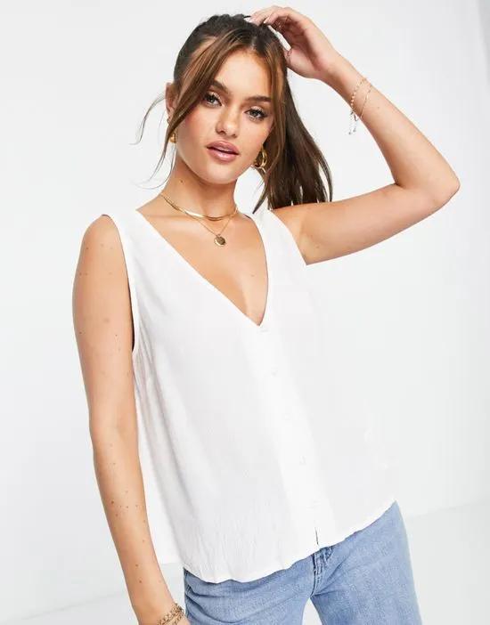 v-neck crinkle tank top with shell buttons in ivory