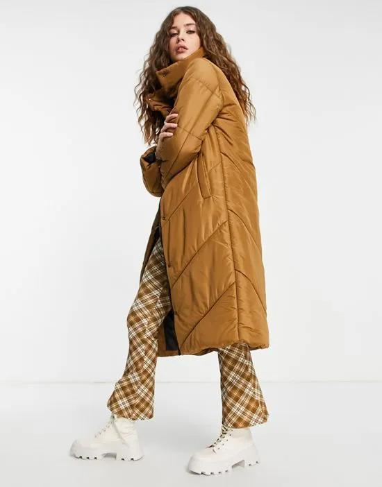 Violet Romance longline puffer coat with funnel neck in tan