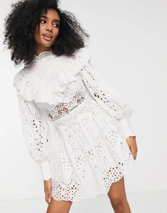 waisted broderie mini dress with ruffle detail in white