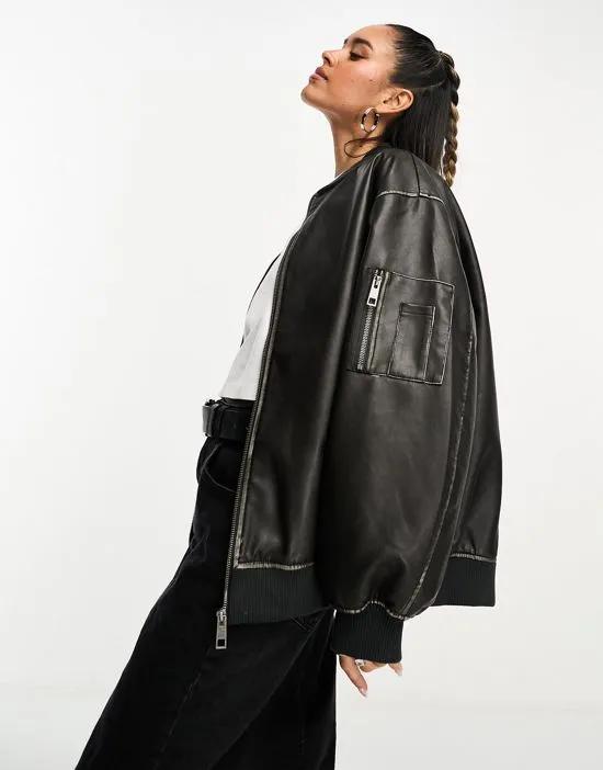 washed faux leather bomber jacket in black