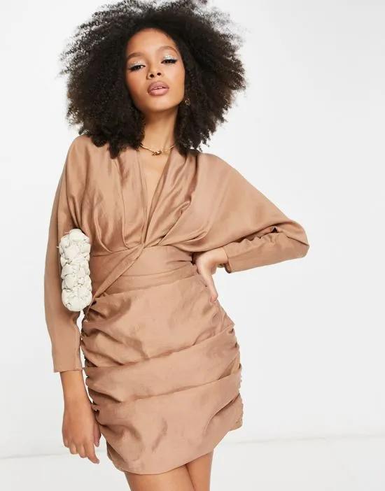 washed twist front long sleeve mini dress with ruching in camel