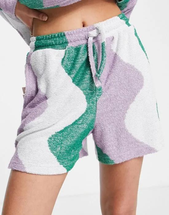 wave print towelling shorts in green - part of a set