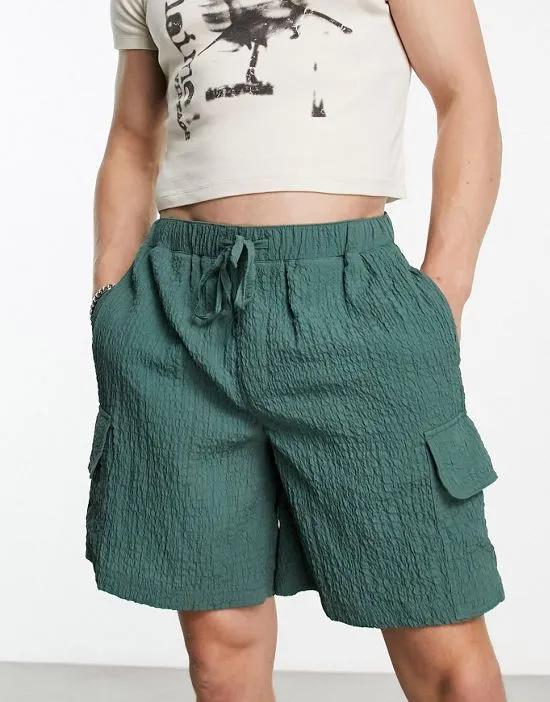 wide cargo shorts with crinkle texture in turquoise
