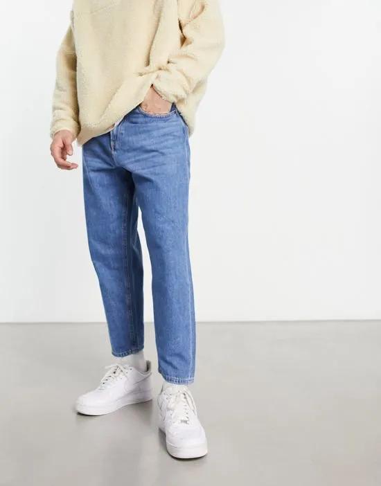 wide fit cropped jeans in mid blue wash