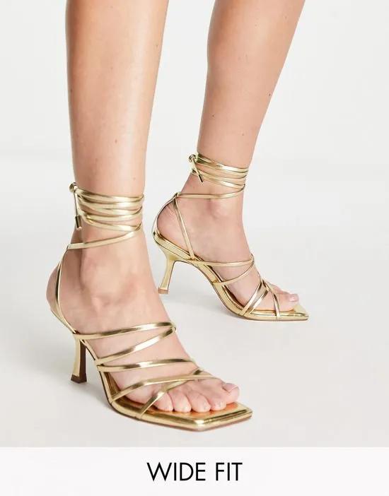 Wide Fit Hiccup strappy tie leg mid heeled sandals in gold
