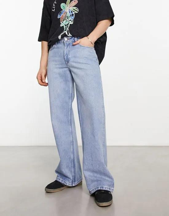 wide flare jeans in mid wash blue