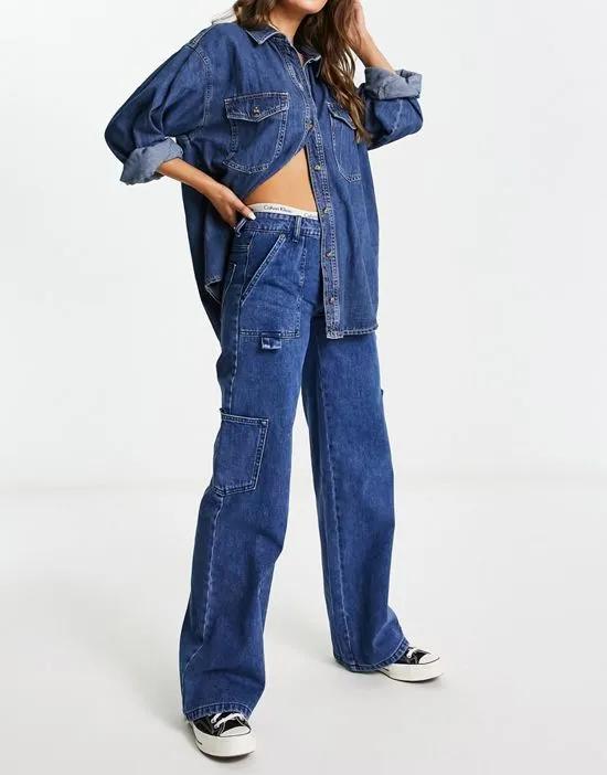 wide leg cargo jeans with pocket details in washed indigo