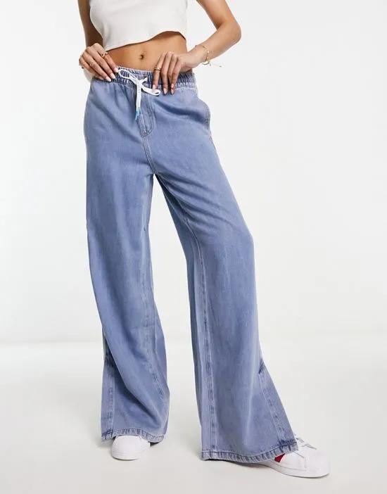 wide leg jeans with tie waist detail in blue