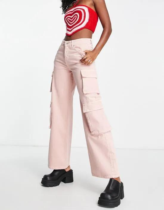 wide leg relaxed cargo jeans in baby pink