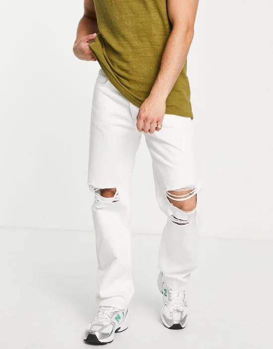 wide straight leg jeans in white with knee rips