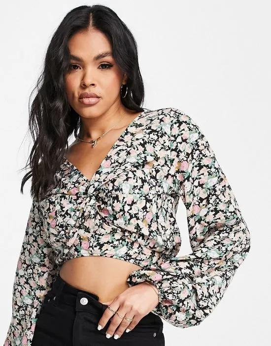 wrap cropped blouse in dark floral