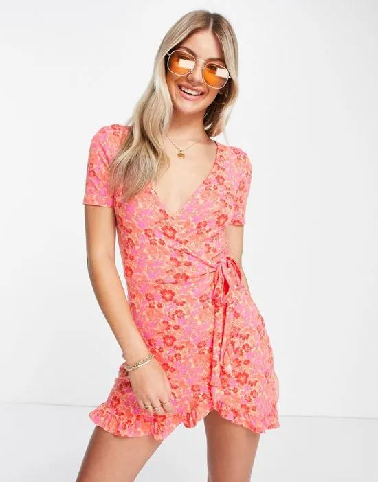wrap front floral mini dress in red