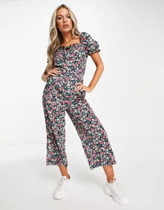 wrap front jumpsuit in navy floral