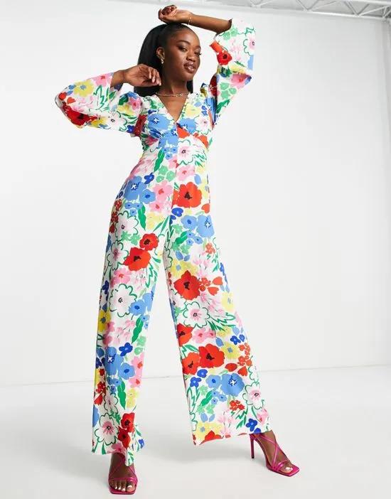 wrap front jumpsuit with open back in bright floral print