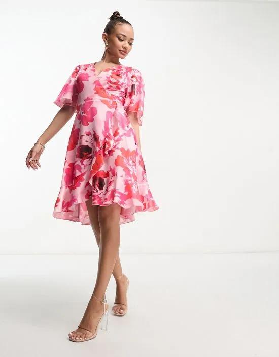 wrap front mini dress with flutter sleeves in pink rose print