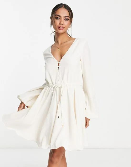 x Anika Teller pleated mini dress in off white