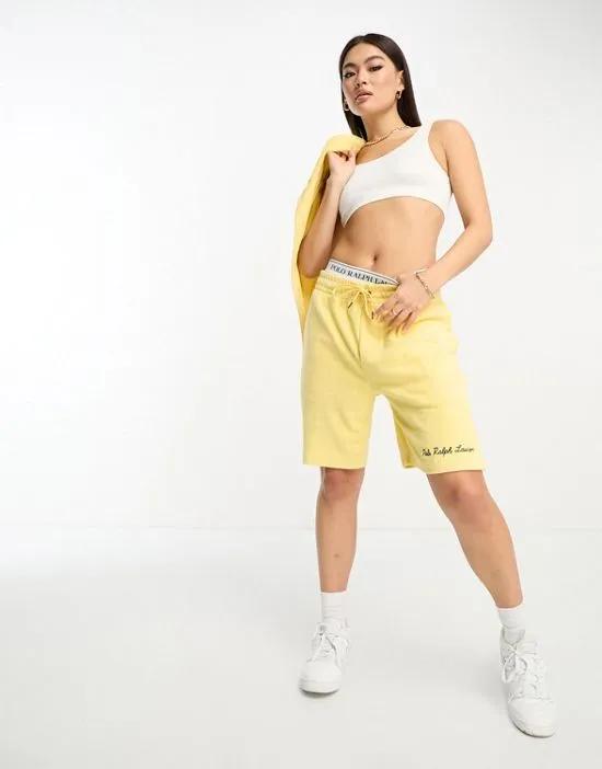 x ASOS exclusive collab terrycloth shorts in yellow with logo