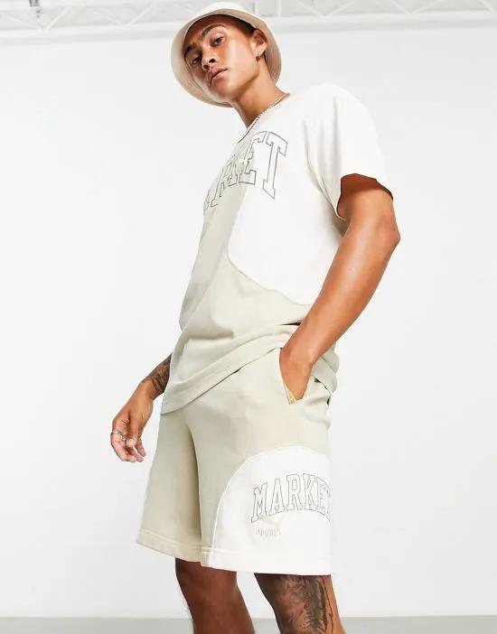 x MARKET Regular 8 inch shorts in off-white
