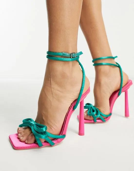 x Paris Artiste Exclusive Lovegames contrast bow detail sandals in pink and green
