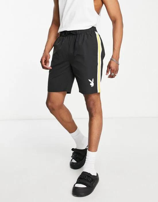x Playboy woven shorts in black with yellow side stripe