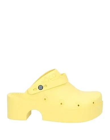 Yellow Mules and clogs